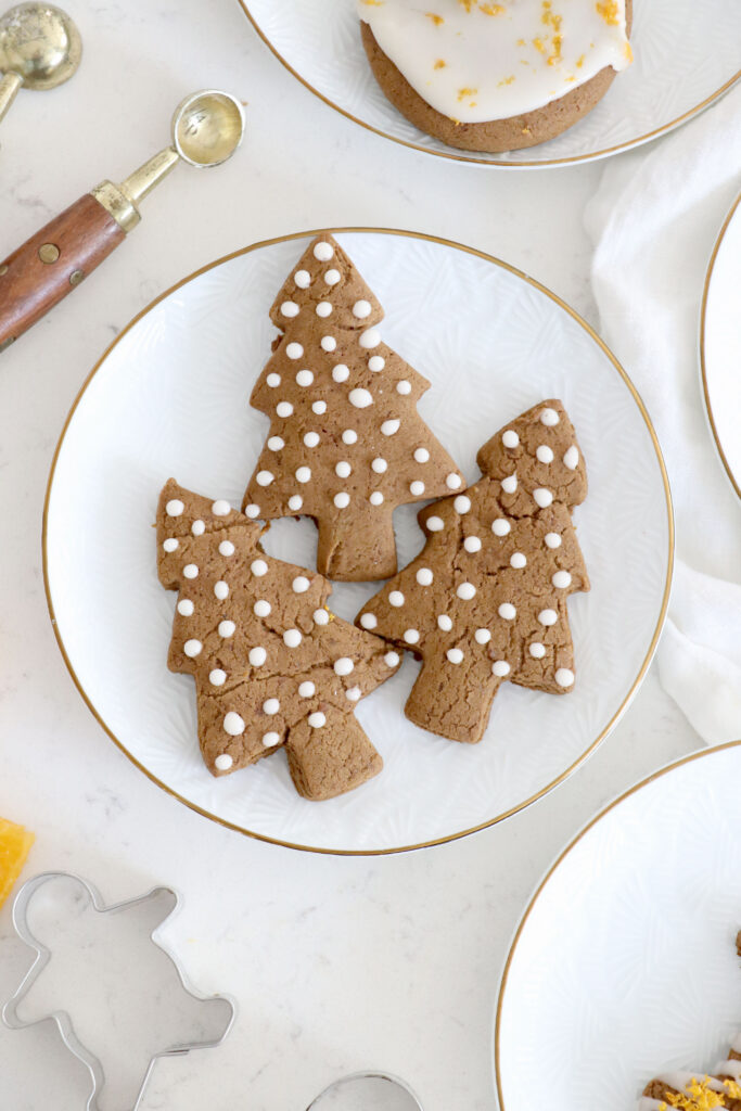 White plates with gingerbread trees.